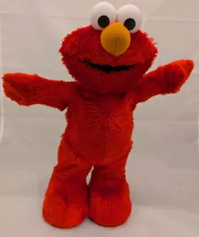 B6678 MATTEL Dancing Hokey Pokey Elmo Sings Dances Spins