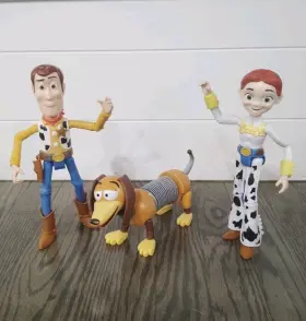 FRX11 MATTEL Disney Pixar Sheriff Woody Jessie Dolls Slinky