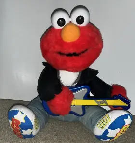 F124511 TYCO Roll Elmo Guitar Music Sings Shakes