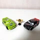 Lot 2 Disney Cars #28 Nitroade & #82 Shiny Wax with Piston Cup Trophy 1/55 loose