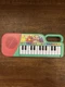 CoComelon First Act Musical Keyboard Piano Toy, 23 Keys Multicolor ABCs.    B4