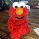 Hasbro Sesame Street Love to Hug Elmo Plush Spanish and English Laughs Sings