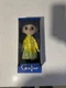 NECA Coraline 10-inch Doll with Laika Button Eyes and Yellow Raincoat