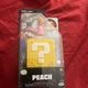 Jakks Pacific Super Mario Bros Movie Peach 1.25 in Figure & Question Block