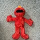  1G Sesame Street Tickle Me Elmo C0923 Hasbro - 2016 14" tall. Laughs & Shakes