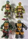 (4) 2012 Viacom Playmates TMNT Action Figures (Leo, Raph, Mikey, Metalhead)