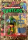 Playmates Toys Teenage Mutant Ninja Turtles Genghis Frog Action Figure (2023)
