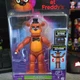 Jazwares Five Nights at Freddy's Freddy Glowing Eyes Jump-Scare Action FNF0008