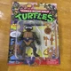 TMNT Teenage Mutant Ninja Turtles Donatello w/ Storage Shell Playmates 2022