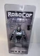 NECA 25th Anniversary RoboCop Spring Loaded Holster 7" Action Figure