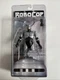 ROBOCOP w- Spring-Loaded Holster 25th Anniversary Figure NECA Brand New & Sealed