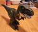 ZURU Robo Alive T-Rex Robotic Pet with Dino Sounds and Glow Scars
