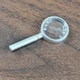 ZURU Mini Brands Books Tiny Books Mystery Pack Pull - Magnifying Glass