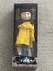 Brand New NECA CORLINE 7" ACTION FIGURE W/ CLOTH RAIN COAT, PANTS, AND BOOTS