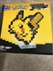 MEGA Pok&eacute;mon Action Figure Building Set, Pikachu with 400 Pieces and Pixel Retro