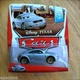 Disney PIXAR Cars JONATHAN SHIFTKO 2014 ALLINOL BLOWOUT diecast 9/9 INTL CARD